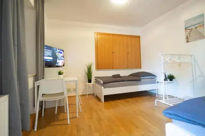 Ein Bett oder Betten in einem Zimmer der Unterkunft KU03 Apartment Monteurswohnung in Kasendorf bei Kulmbach, Bayreuth, Bamberg