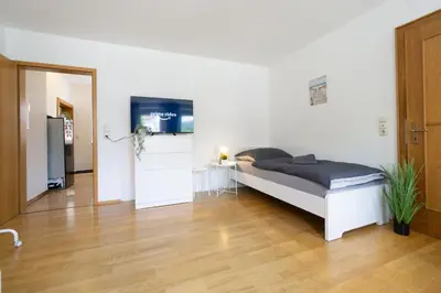 Ein Bett oder Betten in einem Zimmer der Unterkunft KU03 Apartment Monteurswohnung in Kasendorf bei Kulmbach, Bayreuth, Bamberg