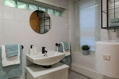 Ein Badezimmer in der Unterkunft Romantisches Rückzugsnest - Waldidylle und Bergblick