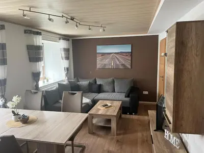 Ein Sitzbereich in der Unterkunft Ferienwohnung Beim Friedlmichl