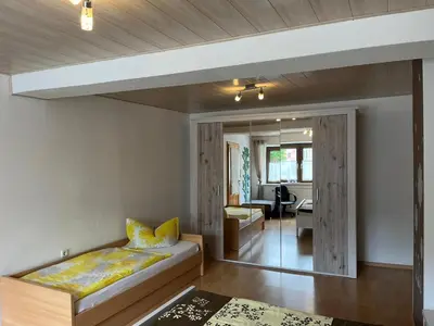 Ein Bett oder Betten in einem Zimmer der Unterkunft Ferienwohnung Beim Friedlmichl
