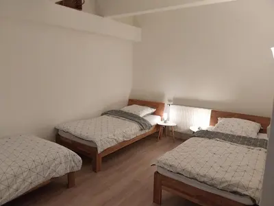 Ein Bett oder Betten in einem Zimmer der Unterkunft Monteurwohnung