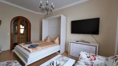 Ein Bett oder Betten in einem Zimmer der Unterkunft FeWo Fürst Metternich, Bad Elster