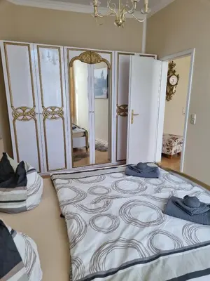 Ein Bett oder Betten in einem Zimmer der Unterkunft FeWo Fürst Metternich, Bad Elster