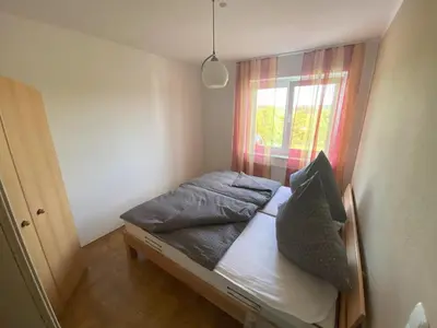 Ein Bett oder Betten in einem Zimmer der Unterkunft Gemütliche Ferienwohnung