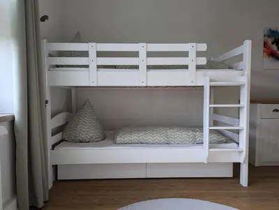 Ein Bett oder Betten in einem Zimmer der Unterkunft FeWo Bergsonne - 2 Schlafzimmer, modern, Familie, ruhige Lage