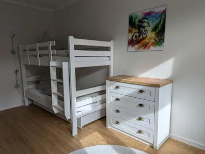 Ein Bett oder Betten in einem Zimmer der Unterkunft FeWo Bergsonne - 2 Schlafzimmer, modern, Familie, ruhige Lage