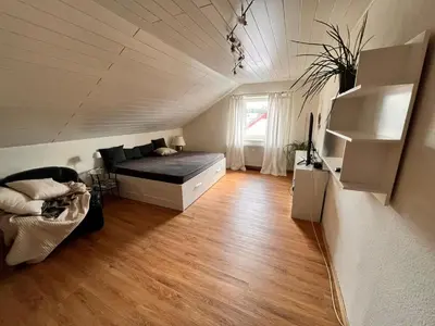 Ein Sitzbereich in der Unterkunft Ferienwohnung Spitzenberger