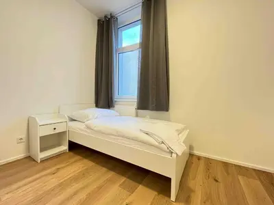 Ein Bett oder Betten in einem Zimmer der Unterkunft AM1056 - Moderne Monteur oder Ferienwohnung