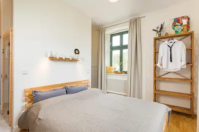 Ein Bett oder Betten in einem Zimmer der Unterkunft Ferienapartments Försterei Eibenstock