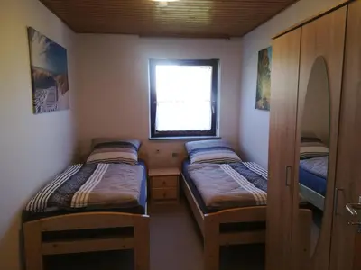 Ein Bett oder Betten in einem Zimmer der Unterkunft Wohnung-Haus für Arbeiter und Monteure bis 11 Personen Amberg