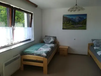 Ein Bett oder Betten in einem Zimmer der Unterkunft Wohnung-Haus für Arbeiter und Monteure bis 11 Personen Amberg