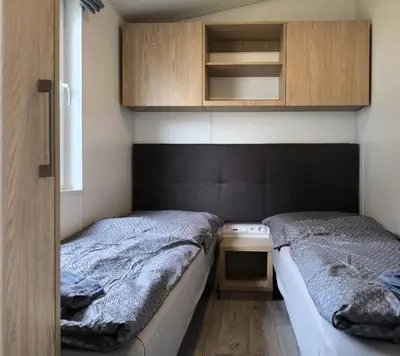 Ein Bett oder Betten in einem Zimmer der Unterkunft Ferienchalet Neunburg vorm Wald Urlaub auf dem Bauernhof