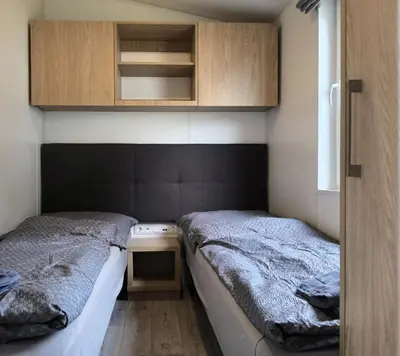 Ein Bett oder Betten in einem Zimmer der Unterkunft Ferienchalet Neunburg vorm Wald Urlaub auf dem Bauernhof
