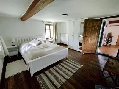 Ein Bett oder Betten in einem Zimmer der Unterkunft Altes Otto Haus