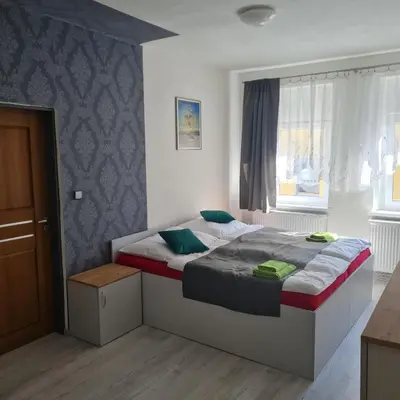 Ein Bett oder Betten in einem Zimmer der Unterkunft Hauptmann5