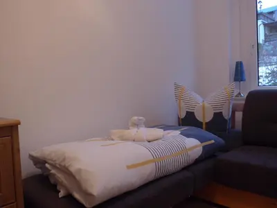 Ein Bett oder Betten in einem Zimmer der Unterkunft Ferienwohnung Bergidylle