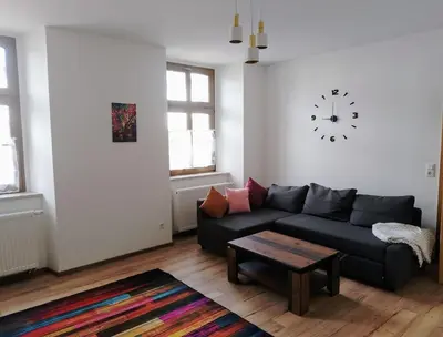 Ein Sitzbereich in der Unterkunft Ferienwohnung im Rittergut Plohn 500 meter zum Freizeitpark