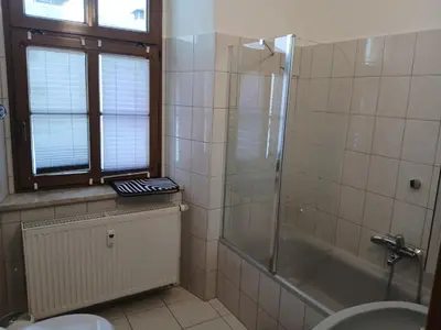 Ein Badezimmer in der Unterkunft Ferienwohnung im Rittergut Plohn 500 meter zum Freizeitpark