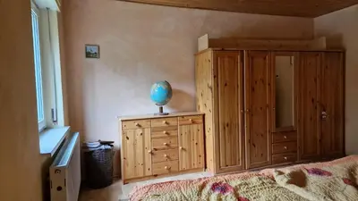 Ein Bett oder Betten in einem Zimmer der Unterkunft Altes Zollhaus im Wald