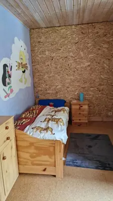 Ein Bett oder Betten in einem Zimmer der Unterkunft Altes Zollhaus im Wald
