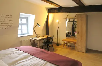 Ein Bett oder Betten in einem Zimmer der Unterkunft Gästehaus Gräf Haus