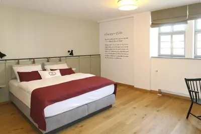 Ein Bett oder Betten in einem Zimmer der Unterkunft Gästehaus Gräf Haus