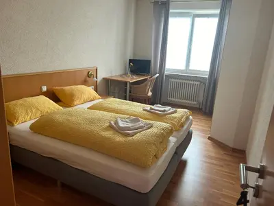 Ein Bett oder Betten in einem Zimmer der Unterkunft Gasthaus & Metzgerei Besenhardt