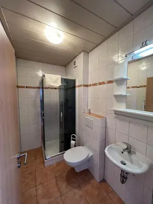 Ein Badezimmer in der Unterkunft Gasthaus & Metzgerei Besenhardt