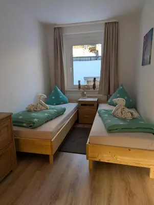 Ein Bett oder Betten in einem Zimmer der Unterkunft Bergidylle