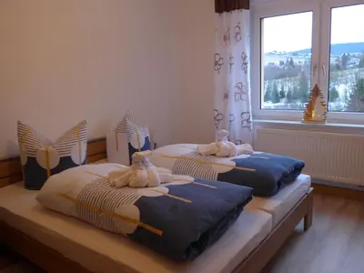 Ein Bett oder Betten in einem Zimmer der Unterkunft Bergidylle