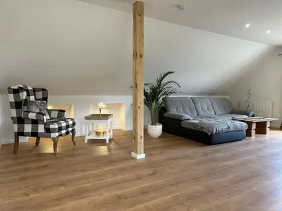 Ein Sitzbereich in der Unterkunft Neuwertige gemütliche Wohnung