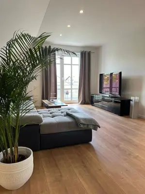 Ein Bett oder Betten in einem Zimmer der Unterkunft Neuwertige gemütliche Wohnung