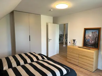 Ein Bett oder Betten in einem Zimmer der Unterkunft Neuwertige gemütliche Wohnung