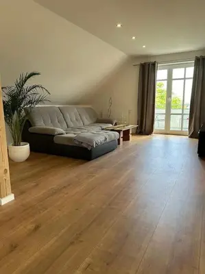 Ein Sitzbereich in der Unterkunft Neuwertige gemütliche Wohnung