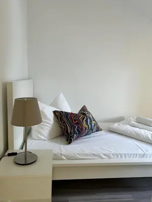 Ein Bett oder Betten in einem Zimmer der Unterkunft Apartment Kornbergblick
