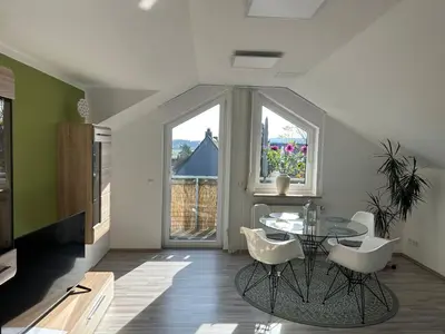 Ein Sitzbereich in der Unterkunft Apartment Kornbergblick
