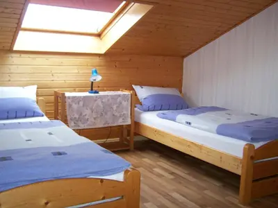 Ein Bett oder Betten in einem Zimmer der Unterkunft Ferienwohnung Bethke