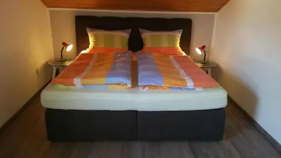 Ein Bett oder Betten in einem Zimmer der Unterkunft Ferienwohnung Bethke