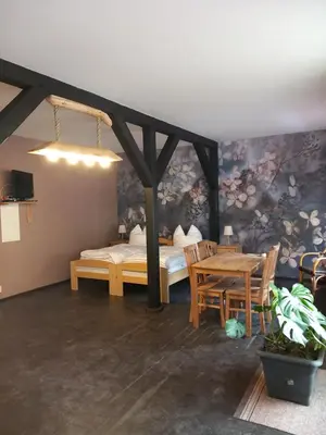Ein Bett oder Betten in einem Zimmer der Unterkunft Pension Steigerhof Johanngeorgenstadt