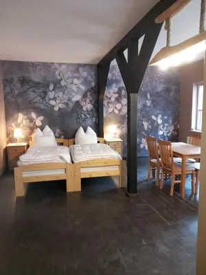 Ein Bett oder Betten in einem Zimmer der Unterkunft Pension Steigerhof Johanngeorgenstadt