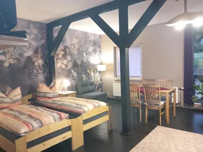 Ein Bett oder Betten in einem Zimmer der Unterkunft Pension Steigerhof Johanngeorgenstadt