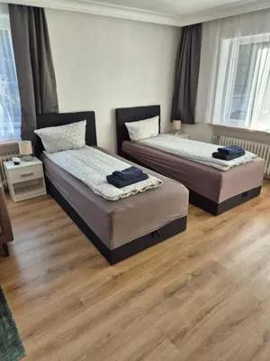 Ein Bett oder Betten in einem Zimmer der Unterkunft Ferienwohnung Selb