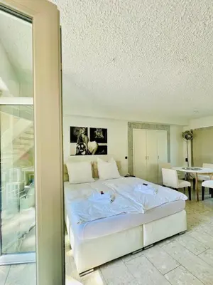 Ein Bett oder Betten in einem Zimmer der Unterkunft Suite 3