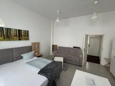 Ein Bett oder Betten in einem Zimmer der Unterkunft Deutscher Hof
