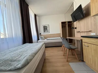 Ein Bett oder Betten in einem Zimmer der Unterkunft Deutscher Hof
