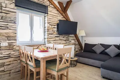 Ein Sitzbereich in der Unterkunft Ferienwohnung Zetzl