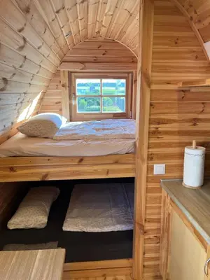 Ein Bett oder Betten in einem Zimmer der Unterkunft Beautiful Apartment II Tiny house