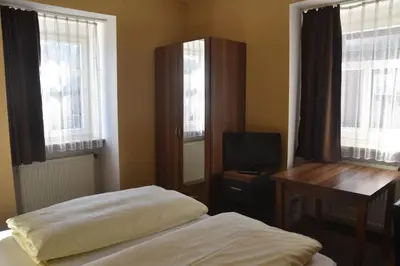 Ein Bett oder Betten in einem Zimmer der Unterkunft Scheffel - Gasthof