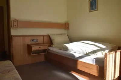 Ein Bett oder Betten in einem Zimmer der Unterkunft Scheffel - Gasthof